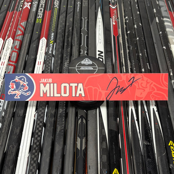 MILOTA FX-RED 24-25 SIGNED NAMEPLATE