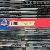 LIND RED-FAUX 25-26 SIGNED NAMEPLATE