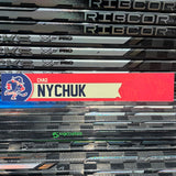 NYCHUCK UNSIGNED NAMEPLATE