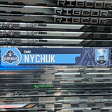 NYCHUCK UNSIGNED NAMEPLATE